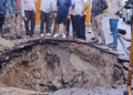 ఒక్కసారిగా కుంగిన రోడ్డు.. గుంతలో పడిన బైక్‌